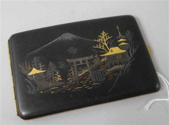 An Arita gold damascened iron cigarette case